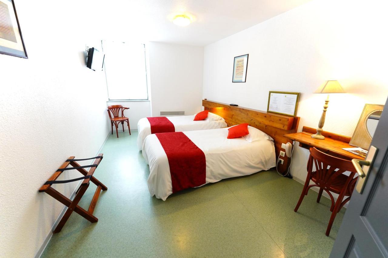 Logis Hotel Le Relais Des Remparts Allanche Eksteriør billede